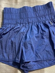 FP Movement shorts. Periwinkle/purple/bluish color. Size M.