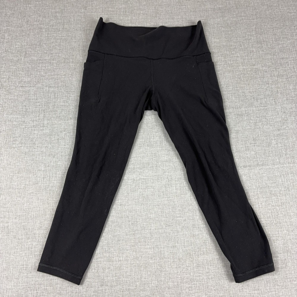 Athleta Leggings Womens M Petite Black Salutation Stash 7/8 Tight Ankle Pockets