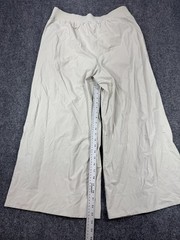 Lululemon Palazzo Pants women’s Size XL Beige Pockets Elastic Waist Ankle Slit