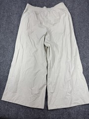 Lululemon Palazzo Pants women’s Size XL Beige Pockets Elastic Waist Ankle Slit