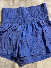 FP Movement shorts. Periwinkle/purple/bluish color. Size M.