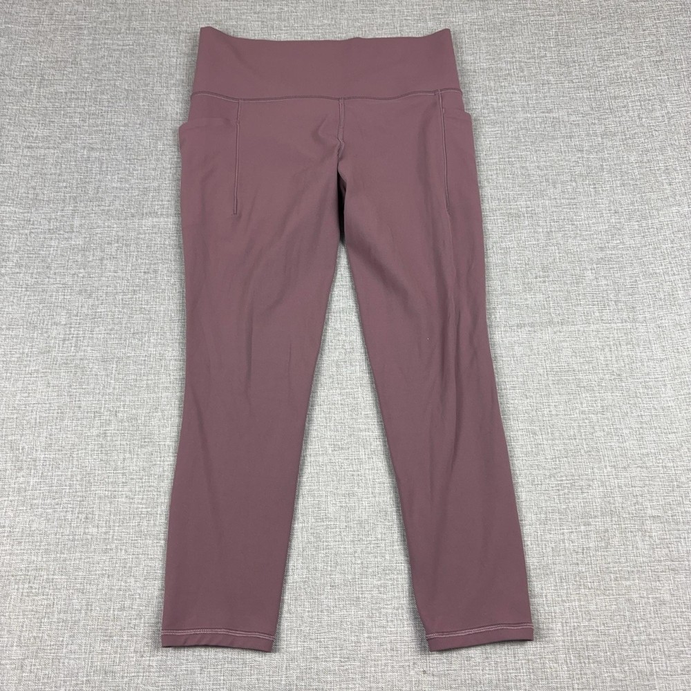 Athleta Leggings Womens M Purple Salutation Stash 7/8 Tight Ankle Pockets Yoga